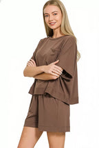 Women’s brown cotton loungewear set with boxy top, chest pocket, and relaxed shorts
