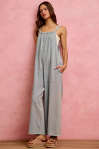 Light denim wide-leg overalls, relaxed fit, front pocket detail