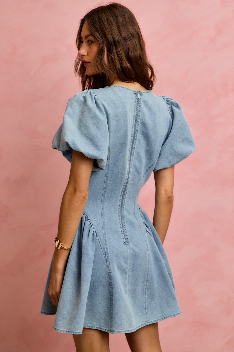 Light-wash denim mini dress with puff sleeves and gathered back yoke