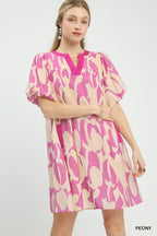 Pink and cream patterned mini dress with V-neck and puff sleeves