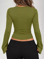 Avocado green lace-trim V-neck long-sleeve tee, back view with ruched waist seam.