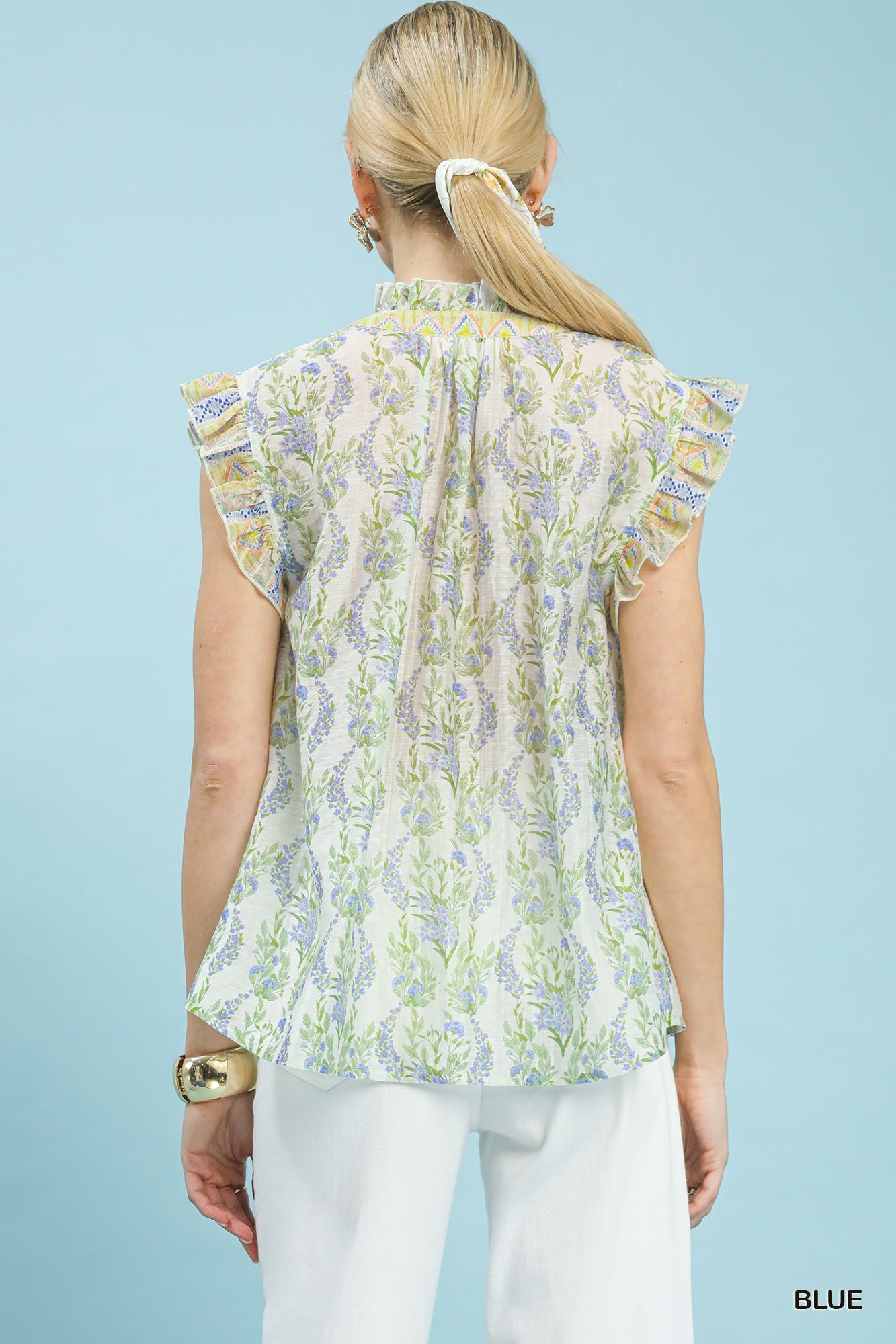 Floral flutter sleeve split-neck top, back view, light blue print