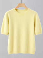Yellow round-neck short-sleeve sweater on hanger, ribbed hem and cuffs