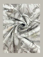 Oversized zip-neck sweatshirt fabric, white-and-gray camouflage print, close-up