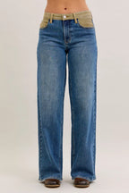 Women’s mid-rise straight jeans with tan corduroy waistband and blue stretch denim