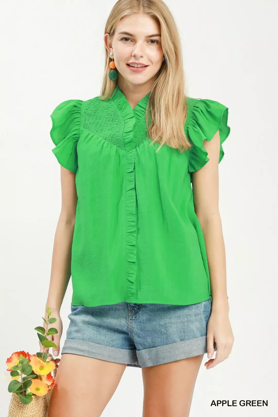 Green smocked yoke blouse with ruffle sleeves and button front