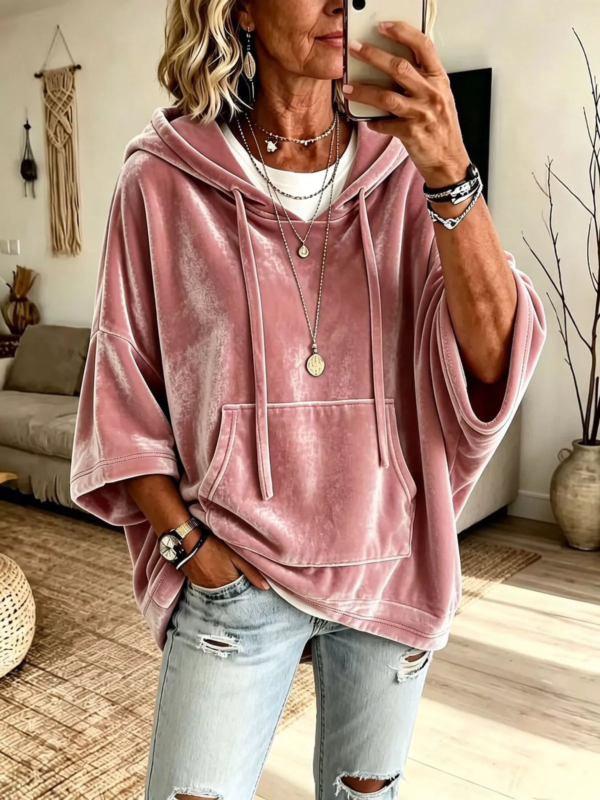 Pink velvet kangaroo pocket hoodie with hood, drawstring ties, and front pocket