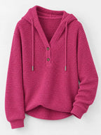 Waffle-knit button hoodie in fuchsia, front view with hood and long sleeves.