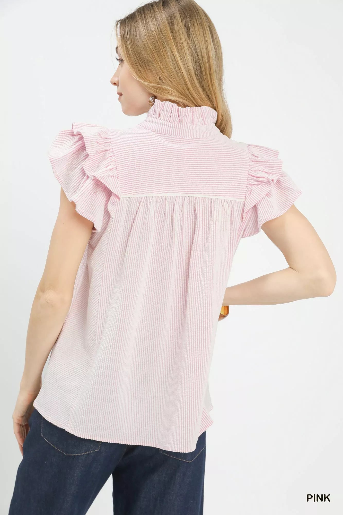Pink textured blouse with ruffled cap sleeves and pintuck look, V-neck