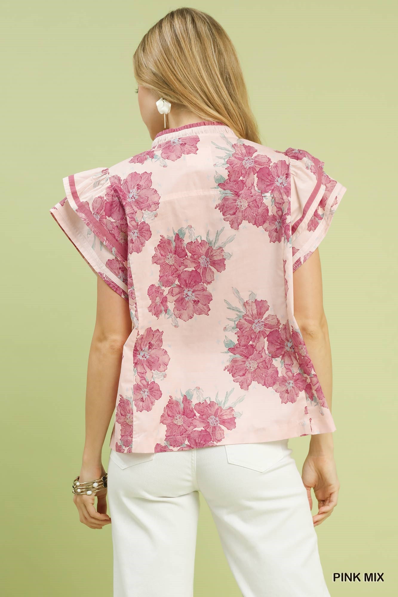 Back view floral flutter-sleeve blouse with pink mix print and ruffled shoulders