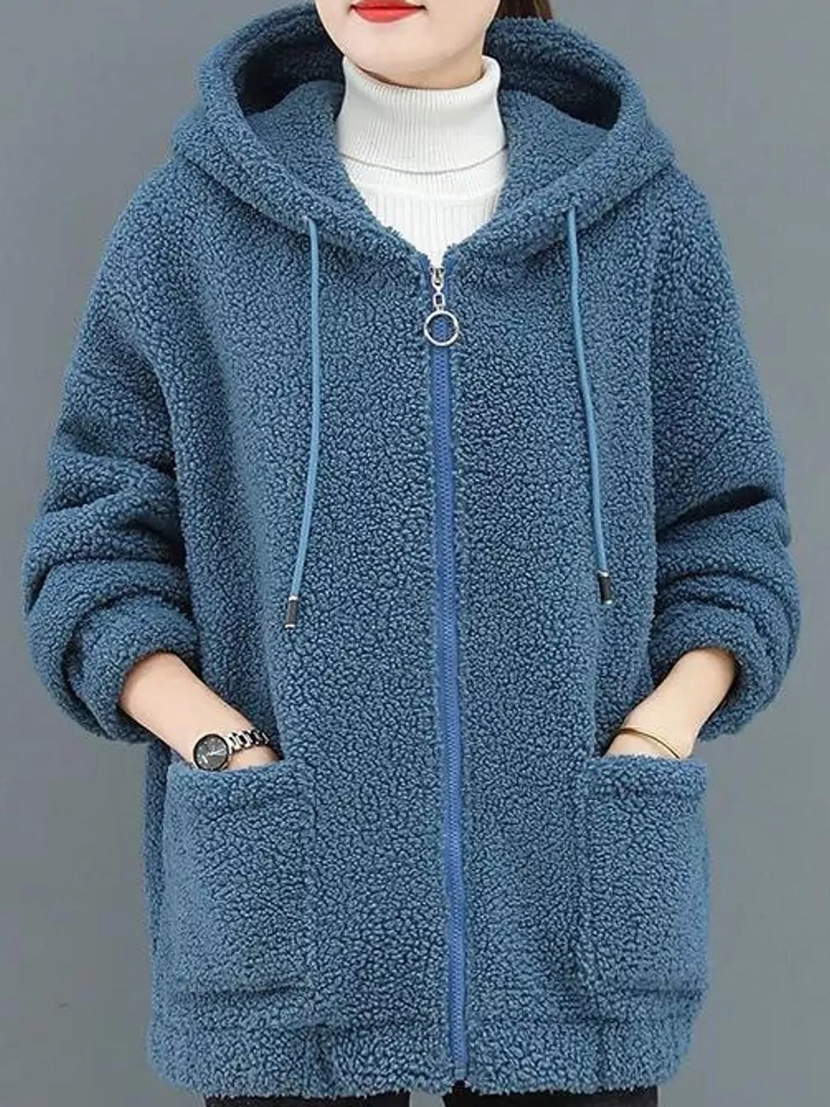 Blue fleece zip-up hoodie with drawstring hood and two front pockets