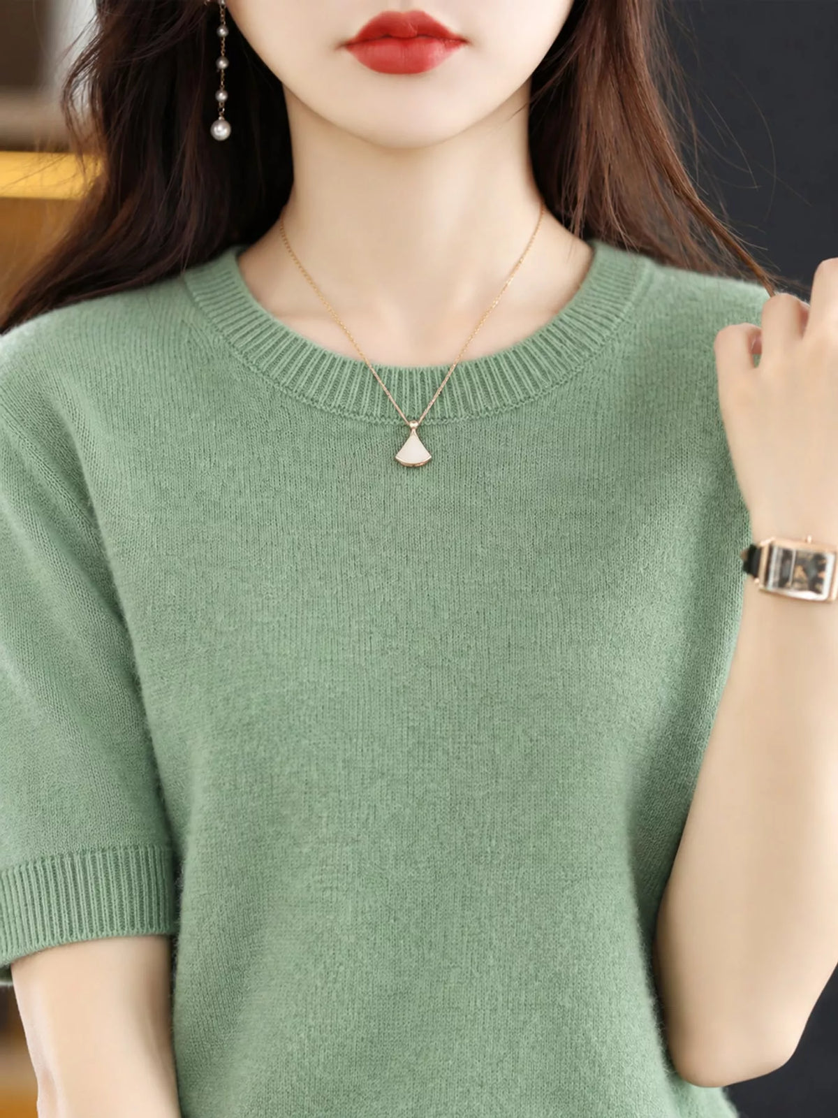 Sea-green round-neck short-sleeve sweater with ribbed crew neckline