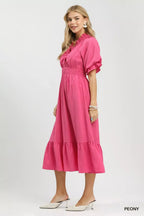 Peony V-neck midi dress with puff sleeves and tiered hem, side view