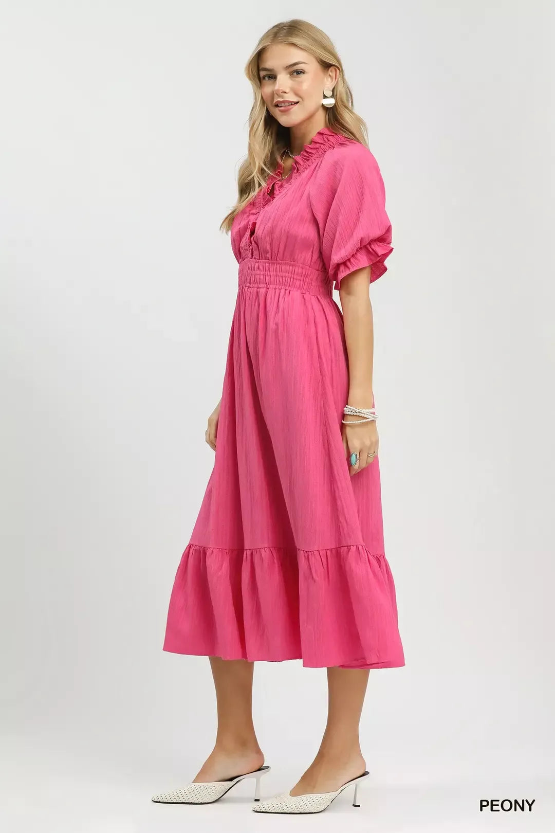 Peony V-neck midi dress with puff sleeves and tiered hem, side view
