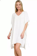White woven cover-up tunic with V-neck, short sleeves, and side tie details