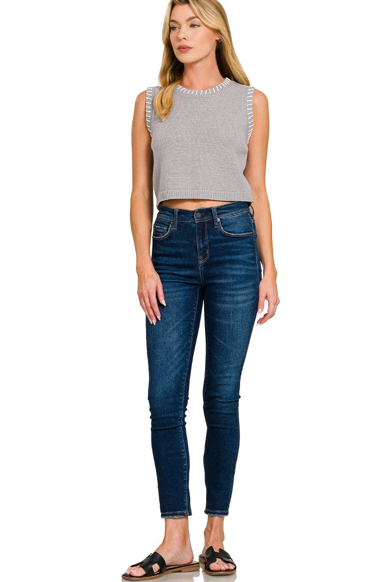 Grey sleeveless cropped sweater vest with ribbed collar and side stitch trim