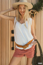 White textured slub tank top with scoop neck and raw-edge hem, sleeveless