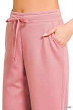 Light rose drawstring joggers with side pocket and smooth scuba fabric