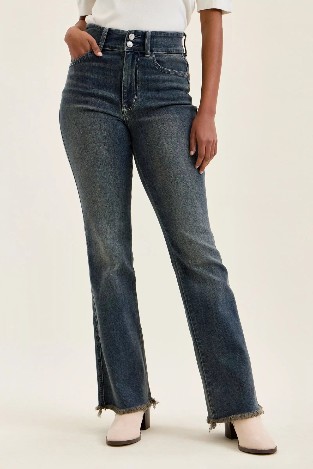 High-waist straight dark blue jeans with frayed hem and five-pocket styling