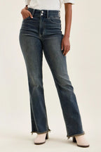 High-waist straight dark blue jeans with frayed hem and five-pocket styling