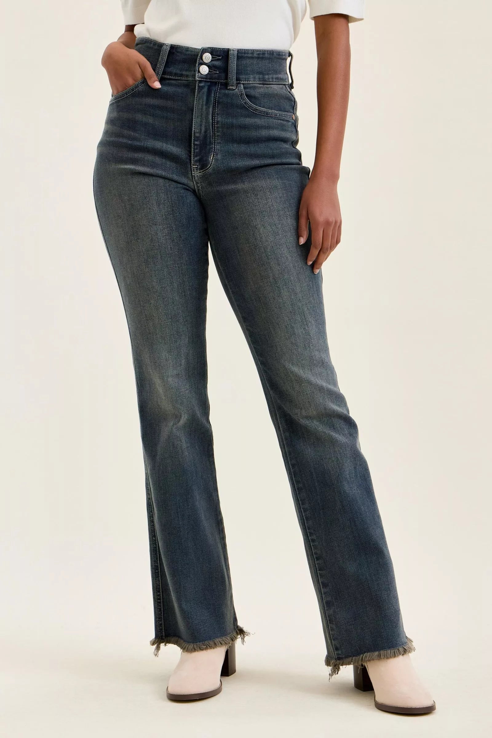High-waist straight dark blue jeans with frayed hem and five-pocket styling