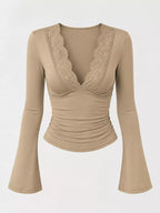 Khaki lace-trim V-neck long sleeve tee with scalloped lace cups and flared sleeves.