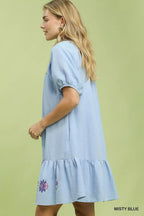 Light blue babydoll dress, embroidered floral hem and short puff sleeves