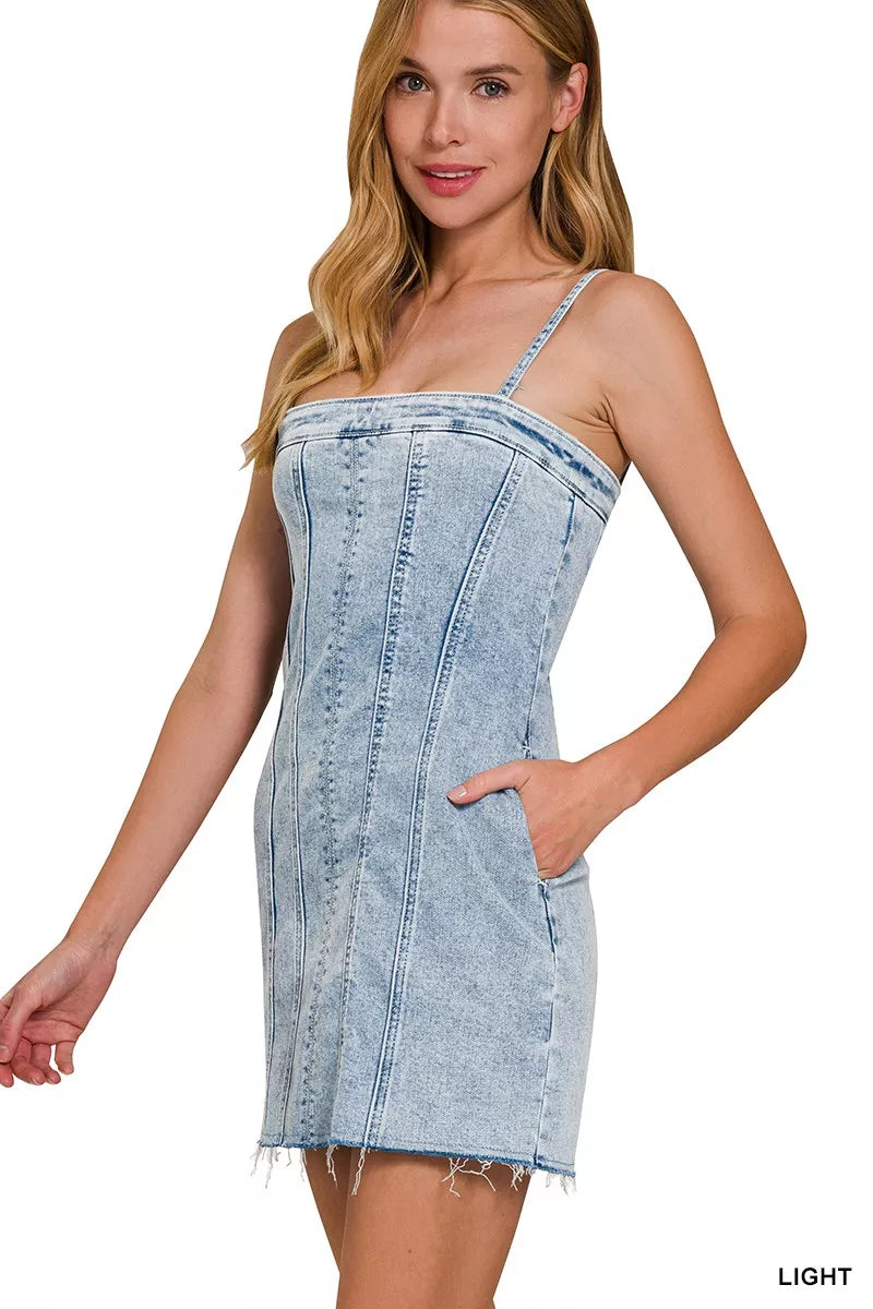 Light wash denim spaghetti strap dress with square neckline and side patch seam details