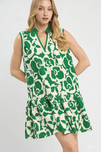 Green sleeveless V-neck tiered mini dress with white floral print