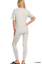 Light cement loungewear set with crewneck short-sleeve top and fitted leggings, back view
