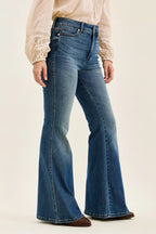 High-waist flare jeans, medium blue denim wash, wide bell-bottom leg opening, belt loops