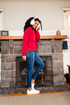 High-waist washed thermal skinny jeans in dark blue denim, model bending view