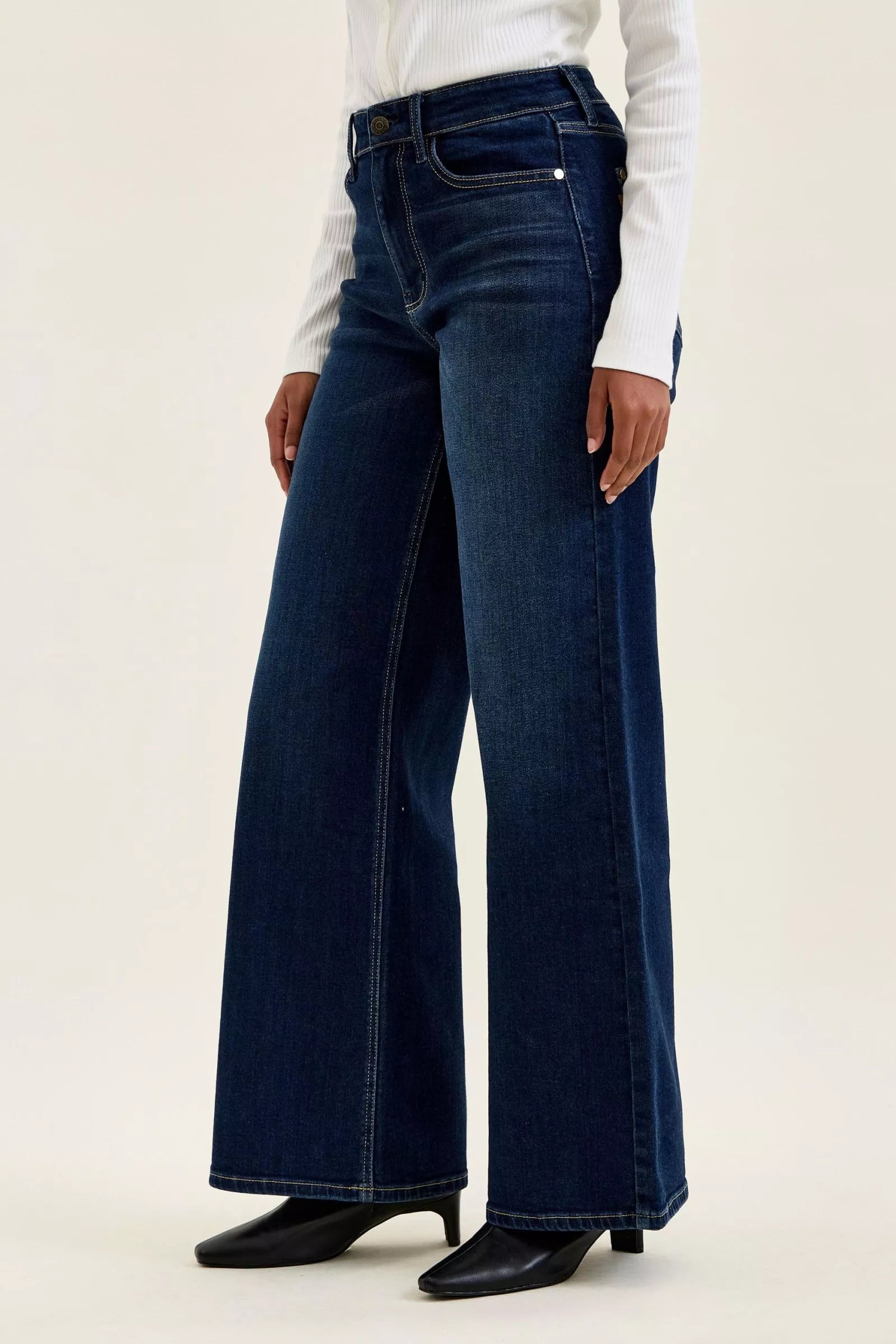 Dark wash wide-leg jeans back view with high-rise waist and belt loops