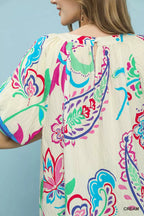 Cream blouse back yoke with multicolor floral border print detail
