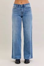 Light blue mid-rise wide-leg jeans with belt loops and five-pocket front