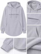 Light gray cat pouch drawstring hoodie close-up with pouch opening and ribbed cuffs