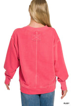 Ruby crew neck sweatshirt back view with center seam and ribbed cuffs