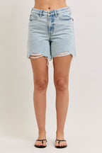 Light wash denim high-waisted shorts with frayed hem and distressed pockets