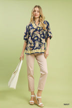 Navy floral boho rayon blouse with V-neck, worn with light cropped pants