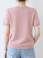 Dusty pink round-neck short-sleeve sweater, ribbed crew collar and cuffs
