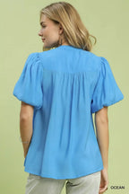 Ocean blue puff sleeve button-down shirt with gathered back yoke