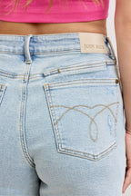 Light wash denim shorts with back pocket stitch detail and Judy Blue logo patch