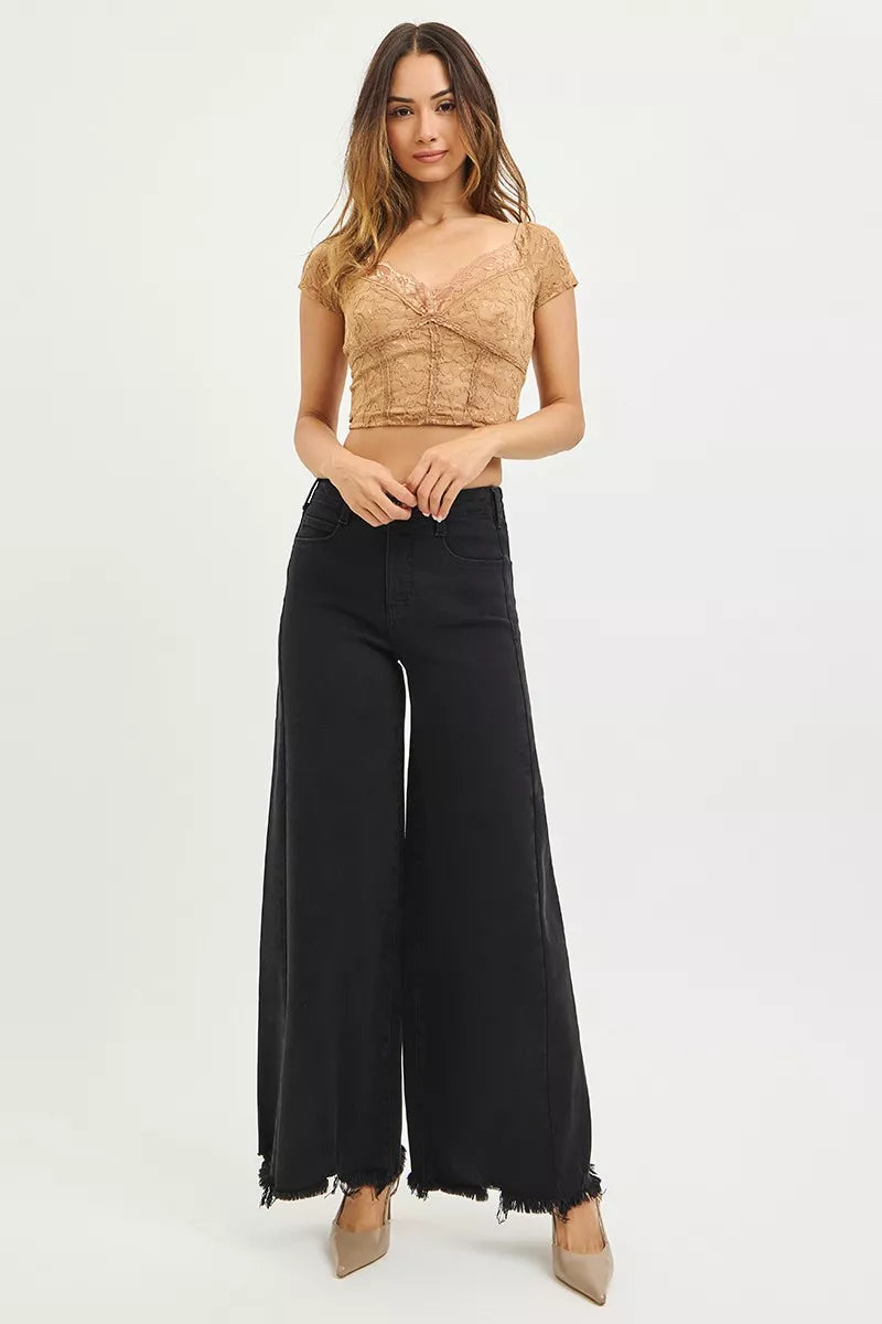 Black high-rise palazzo jeans with frayed hem, wide leg and back patch pockets
