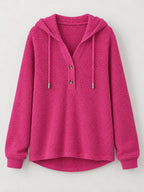 Waffle-knit button hoodie in fuchsia, front view with hood and drawstring cords.