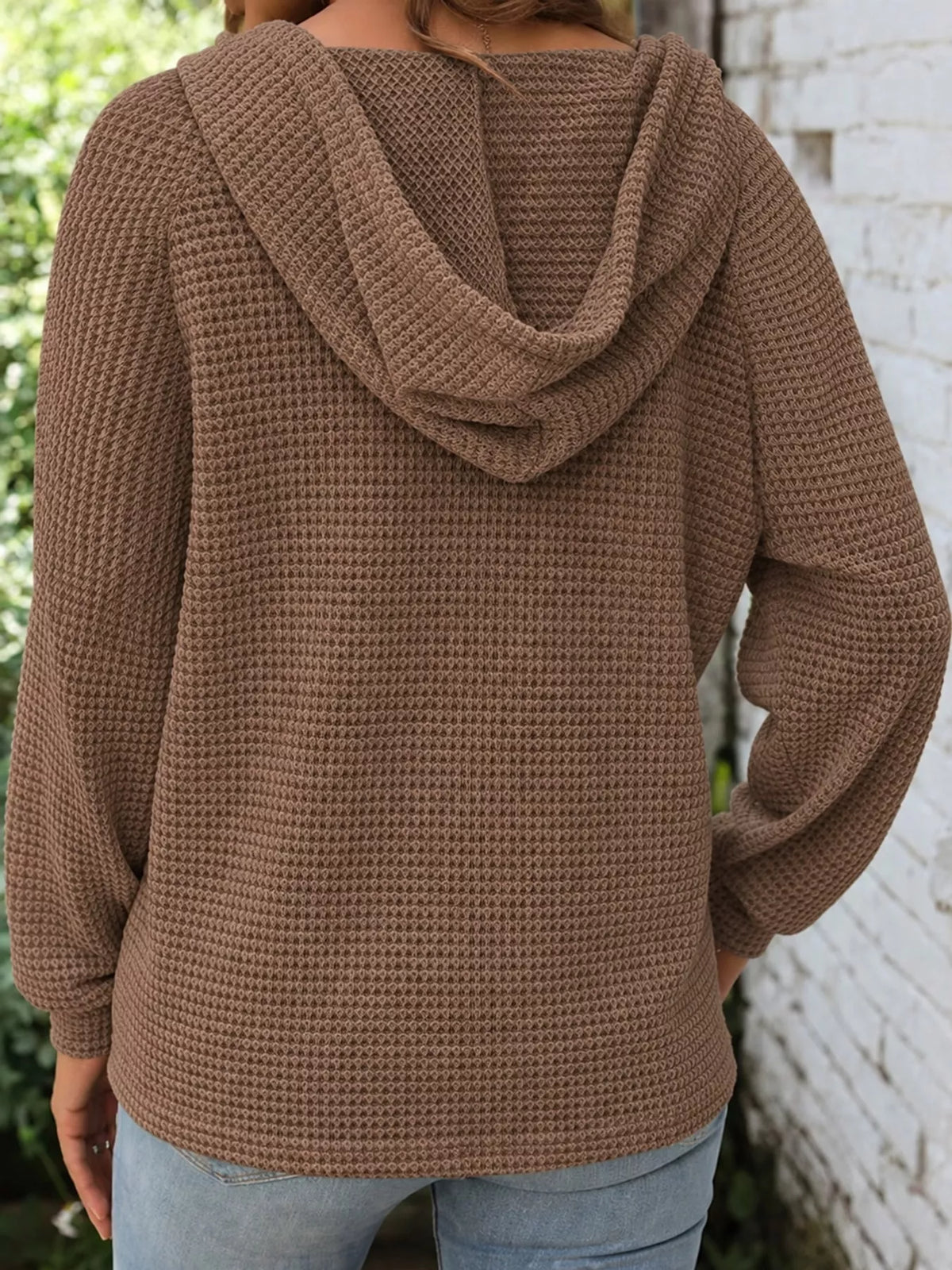 Taupe brown waffle-knit button hoodie with hood and long sleeves, back view