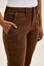 Mahogany wash jeans front close-up with stitched seams and patch pockets