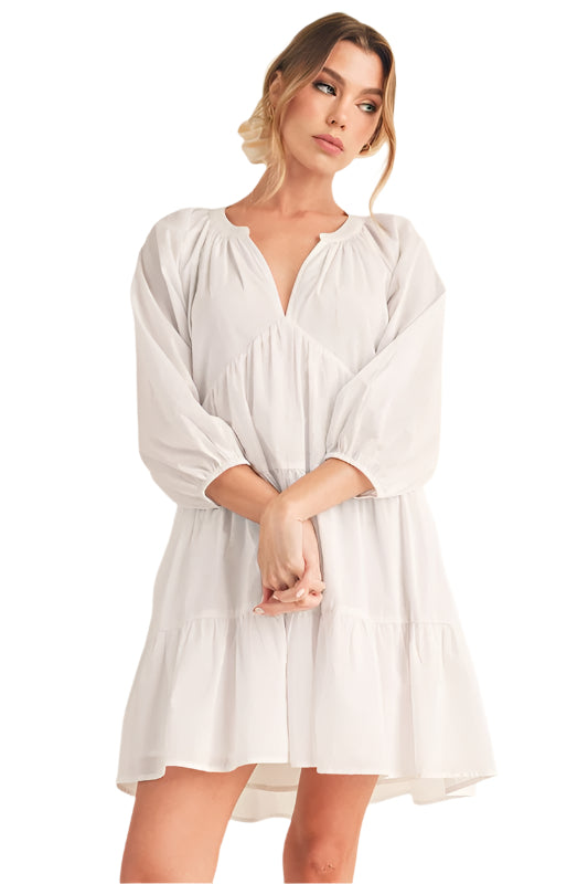 Aemi + Co Notched Balloon Sleeve Tiered Mini Dress