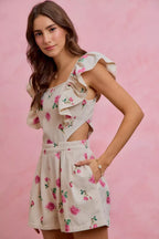 Ivory floral print denim romper with off-shoulder ruffle sleeves and cutout waist
