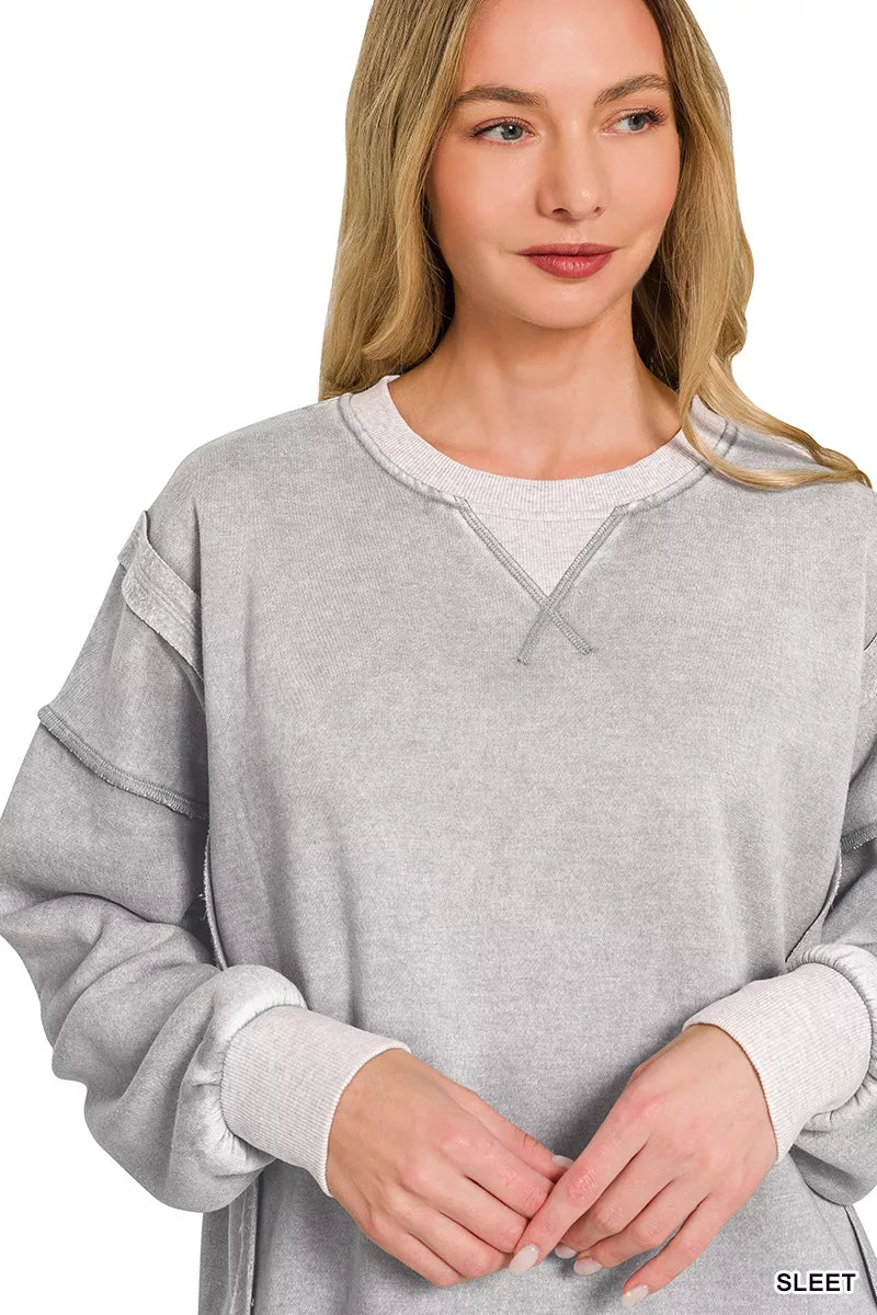 Acid wash crew neck pullover in light gray, relaxed fit with V-neck seam detail