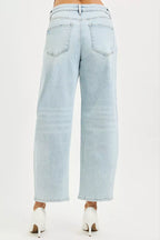 Light wash high-rise crop barrel jeans with back patch pockets and cropped wide leg